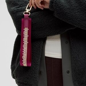 NWT  Lululemon Never Lost Keychain Wordmark in Deep Luxe/Gold/Bone